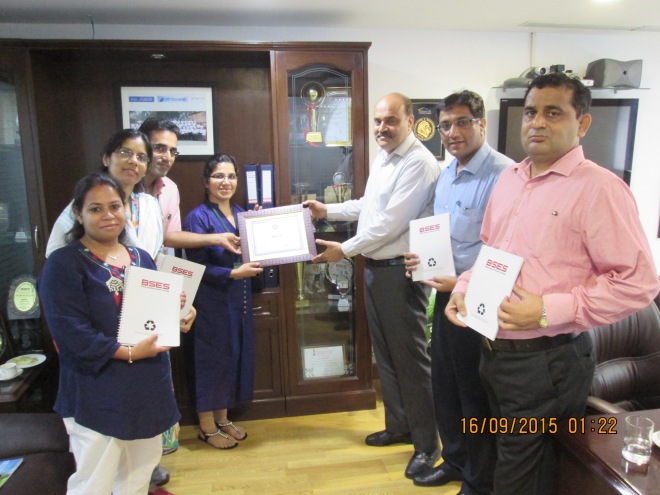 Vasudha and Vivek Mehta of JAAGRUTI Waste Paper Recycling Services hand over the Certificate of Recycling to the CEO of BSES Rajdhani Power Limited in presence of the team at BRPL that helped roll the Paper Recycling Initiative across all offices of theirs in Delhi